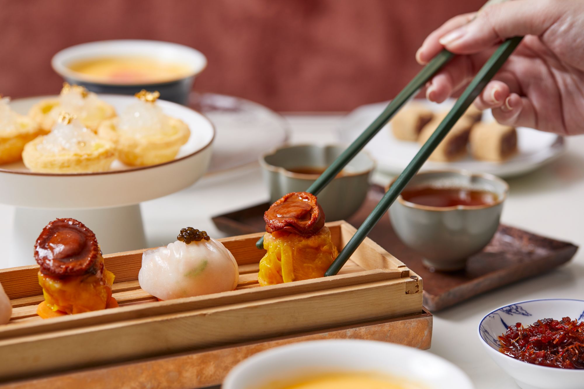 Friends sharing dim sum in Hong Kong